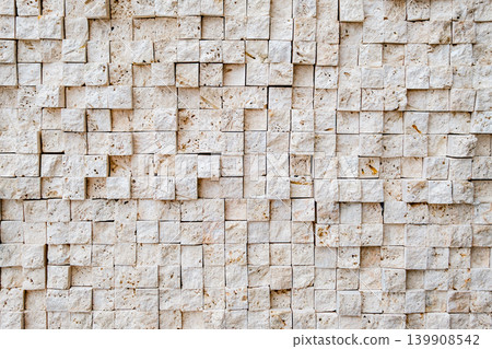 background of wall lined with square stones background of wall lined with square stones 139908542