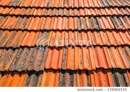 roof is made of old red tiles close-up roof is made of old red tiles close-up 139908545