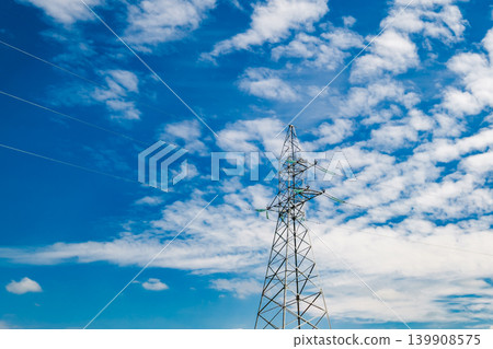 metal support of high-voltage power line against sky metal support of high-voltage power line against sky 139908575