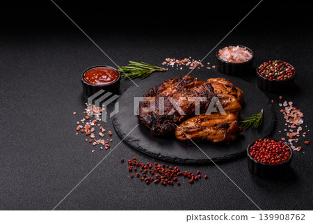 Chicken or turkey, poultry breast baked on the grill or barbecue. Grilled chicken Chicken or turkey, poultry breast baked on the grill or barbecue. Grilled chicken 139908762