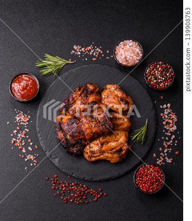 Chicken or turkey, poultry breast baked on the grill or barbecue. Grilled chicken Chicken or turkey, poultry breast baked on the grill or barbecue. Grilled chicken 139908763