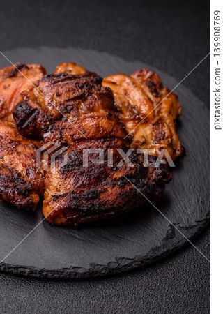 Chicken or turkey, poultry breast baked on the grill or barbecue. Grilled chicken 139908769