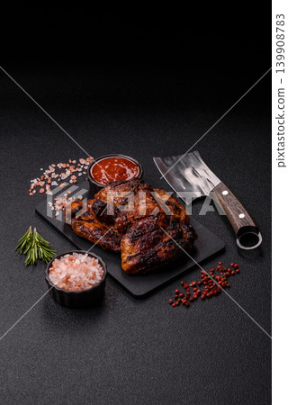 Chicken or turkey, poultry breast baked on the grill or barbecue. Grilled chicken Chicken or turkey, poultry breast baked on the grill or barbecue. Grilled chicken 139908783