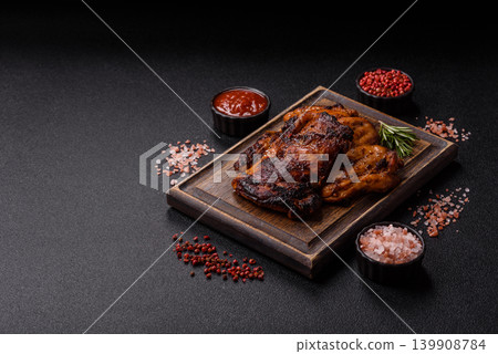 Chicken or turkey, poultry breast baked on the grill or barbecue. Grilled chicken Chicken or turkey, poultry breast baked on the grill or barbecue. Grilled chicken 139908784