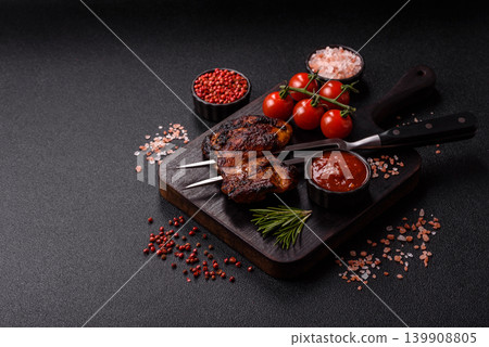 Chicken or turkey, poultry breast baked on the grill or barbecue. Grilled chicken Chicken or turkey, poultry breast baked on the grill or barbecue. Grilled chicken 139908805