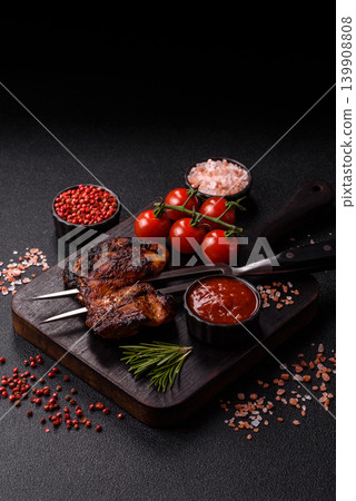 Chicken or turkey, poultry breast baked on the grill or barbecue. Grilled chicken Chicken or turkey, poultry breast baked on the grill or barbecue. Grilled chicken 139908808