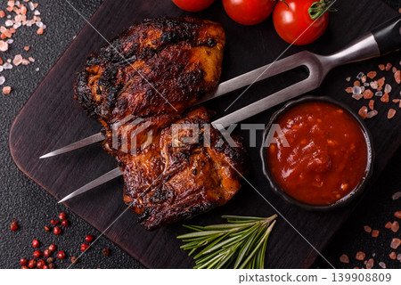 Chicken or turkey, poultry breast baked on the grill or barbecue. Grilled chicken Chicken or turkey, poultry breast baked on the grill or barbecue. Grilled chicken 139908809