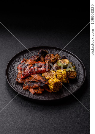 Vegetables such as corn, bell peppers, zucchini, and grilled mushrooms. Grilled vegetables Vegetables such as corn, bell peppers, zucchini, and grilled mushrooms. Grilled vegetables 139908829