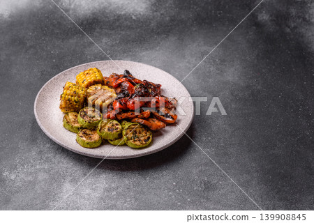 Vegetables such as corn, bell peppers, zucchini, and grilled mushrooms. Grilled vegetables Vegetables such as corn, bell peppers, zucchini, and grilled mushrooms. Grilled vegetables 139908845