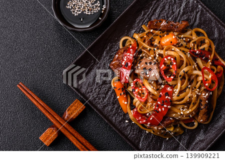 Food, Chinese or Japanese noodles with meat, vegetables, and spices. Noodles with beef 139909221