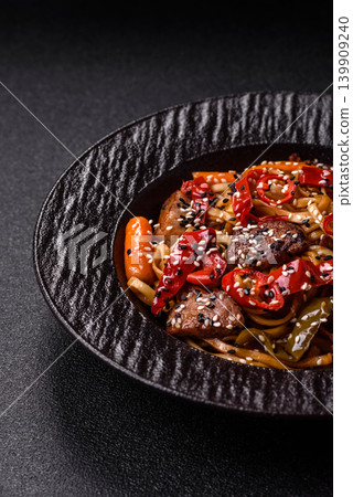 Food, Chinese or Japanese noodles with meat, vegetables, and spices. Noodles with beef 139909240