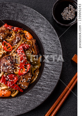 Food, Chinese or Japanese noodles with meat, vegetables, and spices. Noodles with beef Food, Chinese or Japanese noodles with meat, vegetables, and spices. Noodles with beef 139909243