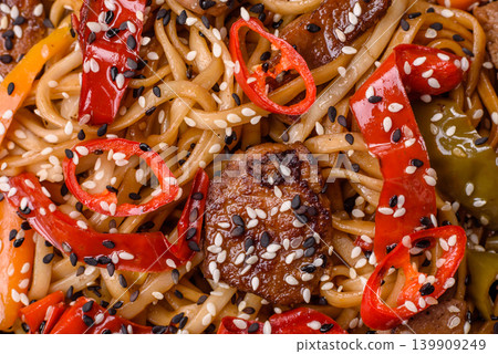 Food, Chinese or Japanese noodles with meat, vegetables, and spices. Noodles with beef Food, Chinese or Japanese noodles with meat, vegetables, and spices. Noodles with beef 139909249