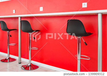 high chairs in the cafe in front of the counter high chairs in the cafe in front of the counter 139909312