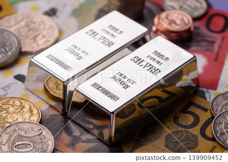 A silver bar, white metal against a backdrop of Swiss flag, as a concept for the sales. A silver bar A silver bar, white metal against a backdrop of Swiss flag, as a concept for the sales. A silver bar 139909452