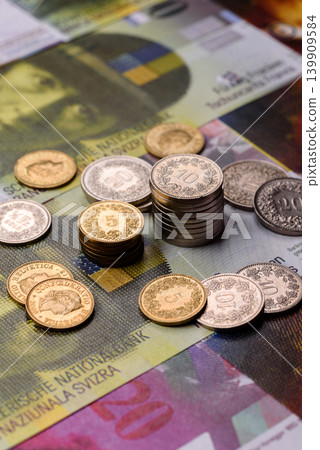 Switzerland, Swiss franc paper money and coins, financing and commodity exchange. Swiss currency Switzerland, Swiss franc paper money and coins, financing and commodity exchange. Swiss currency 139909584