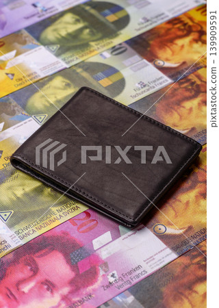 Switzerland, Swiss franc paper money and coins, financing and commodity exchange. Swiss currency Switzerland, Swiss franc paper money and coins, financing and commodity exchange. Swiss currency 139909591