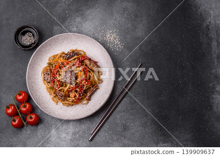 Food, Chinese or Japanese noodles with meat, vegetables, and spices. Noodles with beef Food, Chinese or Japanese noodles with meat, vegetables, and spices. Noodles with beef 139909637