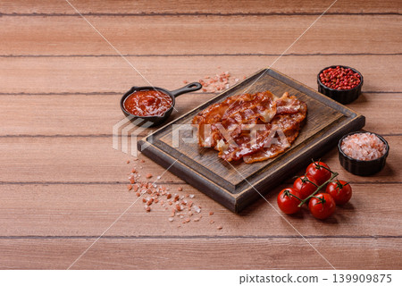 Fried fresh bacon slices with layers of meat or prosciutto with salt and spices. Fried bacon Fried fresh bacon slices with layers of meat or prosciutto with salt and spices. Fried bacon 139909875