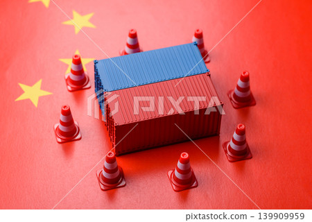 The cargo container ban on the China flag as a conceptual backdrop. The cargo container embargo The cargo container ban on the China flag as a conceptual backdrop. The cargo container embargo 139909959
