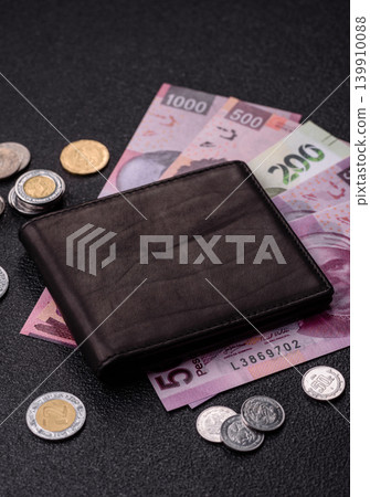 Mexico, Mexican peso, paper money and coins, financing and commodity exchange. Mexican currency Mexico, Mexican peso, paper money and coins, financing and commodity exchange. Mexican currency 139910088