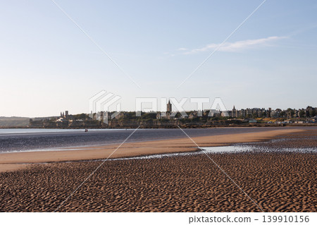 wide flat beach on sunny evening, St Andrews, Scotland wide flat beach on sunny evening, St Andrews, Scotland 139910156