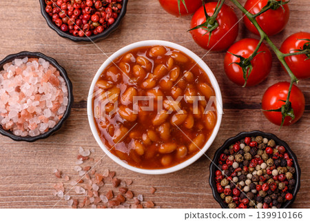 Beans in tomato sauce, a canned stew for the dinner table. Beans in tomato sauce Beans in tomato sauce, a canned stew for the dinner table. Beans in tomato sauce 139910166