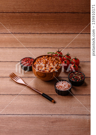 Beans in tomato sauce, a canned stew for the dinner table. Beans in tomato sauce Beans in tomato sauce, a canned stew for the dinner table. Beans in tomato sauce 139910171