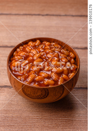 Beans in tomato sauce, a canned stew for the dinner table. Beans in tomato sauce Beans in tomato sauce, a canned stew for the dinner table. Beans in tomato sauce 139910176