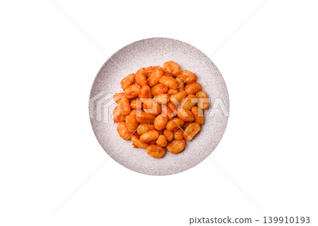 Homemade potato gnocchi with Bolognese sauce, seasoned with salt and spices. Gnocchi with sauce Homemade potato gnocchi with Bolognese sauce, seasoned with salt and spices. Gnocchi with sauce 139910193