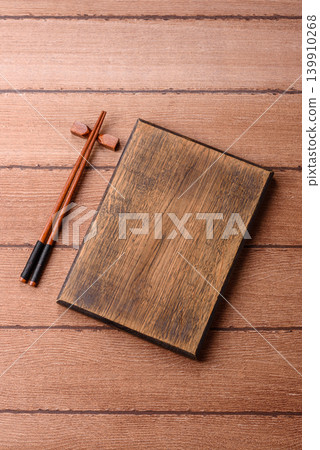 Empty wooden cutting board for preparing ingredients for home cooking. An empty cutting board 139910268