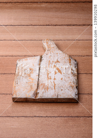 Empty wooden cutting board for preparing ingredients for home cooking. An empty cutting board Empty wooden cutting board for preparing ingredients for home cooking. An empty cutting board 139910298