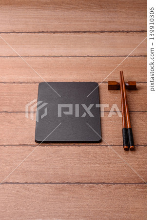 An empty slate cutting board for preparing ingredients for home cooking. An empty cutting board An empty slate cutting board for preparing ingredients for home cooking. An empty cutting board 139910306