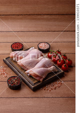 Fresh raw chicken or turkey legs for diet food. Raw chicken legs Fresh raw chicken or turkey legs for diet food. Raw chicken legs 139910371
