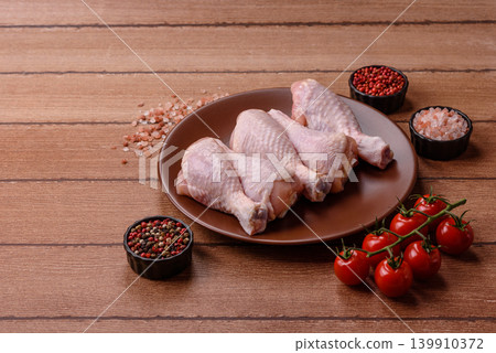 Fresh raw chicken or turkey legs for diet food. Raw chicken legs Fresh raw chicken or turkey legs for diet food. Raw chicken legs 139910372