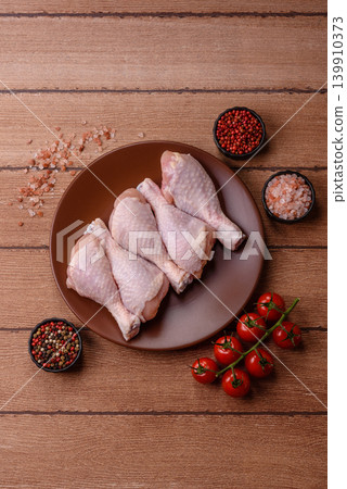 Fresh raw chicken or turkey legs for diet food. Raw chicken legs Fresh raw chicken or turkey legs for diet food. Raw chicken legs 139910373