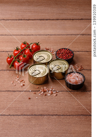 A metal tin can of meat, fish, or dog or cat food. A tin can of food A metal tin can of meat, fish, or dog or cat food. A tin can of food 139910389