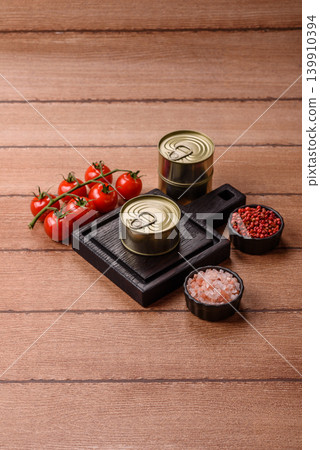 A metal tin can of meat, fish, or dog or cat food. A tin can of food A metal tin can of meat, fish, or dog or cat food. A tin can of food 139910394