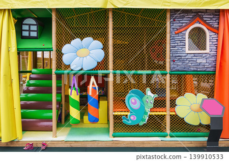 Childrens play attraction in form of labyrinth Childrens play attraction in form of labyrinth 139910533