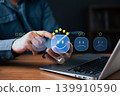 Customer satisfaction survey concept, hand touching smartphone to select happy face with five stars. Online service rating, user experience, business review, positive opinion. 139910590