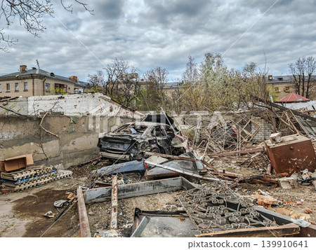 Destroyed car and garages was at epicenter of russian missile explosion Destroyed car and garages was at epicenter of russian missile explosion 139910641