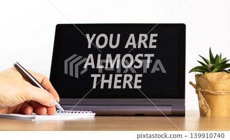 You are almost there words symbol. Concept words You are almost there on beautiful black tablet. Beautiful white background. Business You are almost there motivational support concept. Copy space. You are almost there words symbol. Concept words You are almost there on beautiful black tablet. Beautiful white background. Business You are almost there motivational support concept. Copy space. 139910740