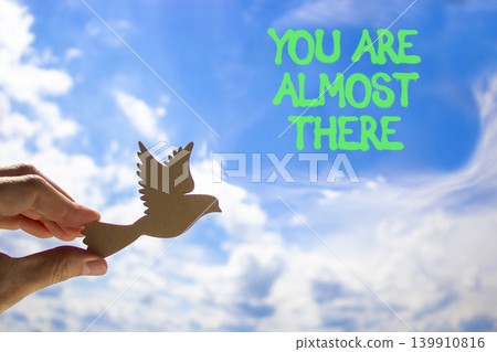 You are almost there words symbol. Concept words You are almost there on beautiful blue sky. Beautiful blue sky background. Business You are almost there motivational support concept. Copy space. You are almost there words symbol. Concept words You are almost there on beautiful blue sky. Beautiful blue sky background. Business You are almost there motivational support concept. Copy space. 139910816