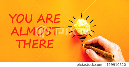 You are almost there words symbol. Concept words You are almost there on beautiful orange paper. Beautiful orange background. Business You are almost there motivational support concept. Copy space. You are almost there words symbol. Concept words You are almost there on beautiful orange paper. Beautiful orange background. Business You are almost there motivational support concept. Copy space. 139910820