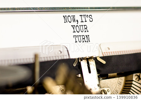 Now it's your turn words symbol. Concept words Now it's your turn typed on beautiful retro typewriter. Beautiful white background. Business Now it's your turn motivational support concept. Copy space. Now it's your turn words symbol. Concept words Now it's your turn typed on beautiful retro typewriter. Beautiful white background. Business Now it's your turn motivational support concept. Copy space. 139910836