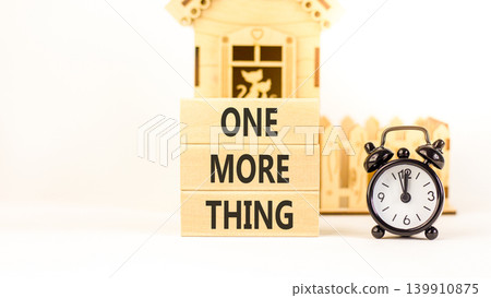 One more thing words symbol. Concept words One more thing on beautiful wooden blocks. Beautiful white background. Black alarm clock. Business and one more thing concept. Copy space. One more thing words symbol. Concept words One more thing on beautiful wooden blocks. Beautiful white background. Black alarm clock. Business and one more thing concept. Copy space. 139910875