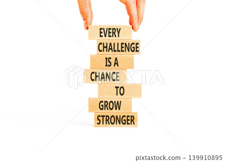 Challenge word symbol. Concept words Every challenge is a chance to grow stronger on beautiful wooden blocks. Beautiful white paper background. Business challenge is opportunity concept. Copy space. 139910895