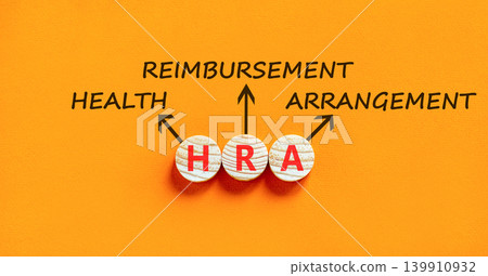 HRA health reimbursement arrangement symbol. Concept words HRA health reimbursement arrangement on beautiful wooden circles. Beautiful orange background. Medical HRA concept. Copy space. HRA health reimbursement arrangement symbol. Concept words HRA health reimbursement arrangement on beautiful wooden circles. Beautiful orange background. Medical HRA concept. Copy space. 139910932