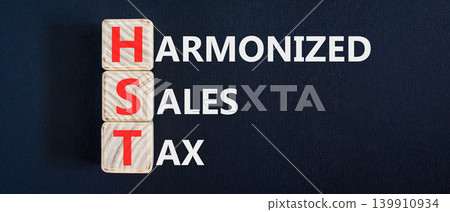 HST harmonized sales tax symbol. Concept words HST harmonized sales tax on beautiful wooden blocks. Beautiful black background. Business HST harmonized sales tax concept. Copy space 139910934