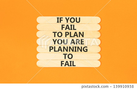 Planning to fail symbol. Concept words If you fail to plan you are planning to fail on beautiful wooden sticks. Beautiful orange paper background. Business planning to fail concept. Copy space. Planning to fail symbol. Concept words If you fail to plan you are planning to fail on beautiful wooden sticks. Beautiful orange paper background. Business planning to fail concept. Copy space. 139910938